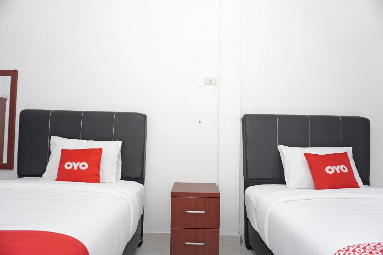 Sinapuran Oyo 2635 Ramos Inn מראה חיצוני תמונה